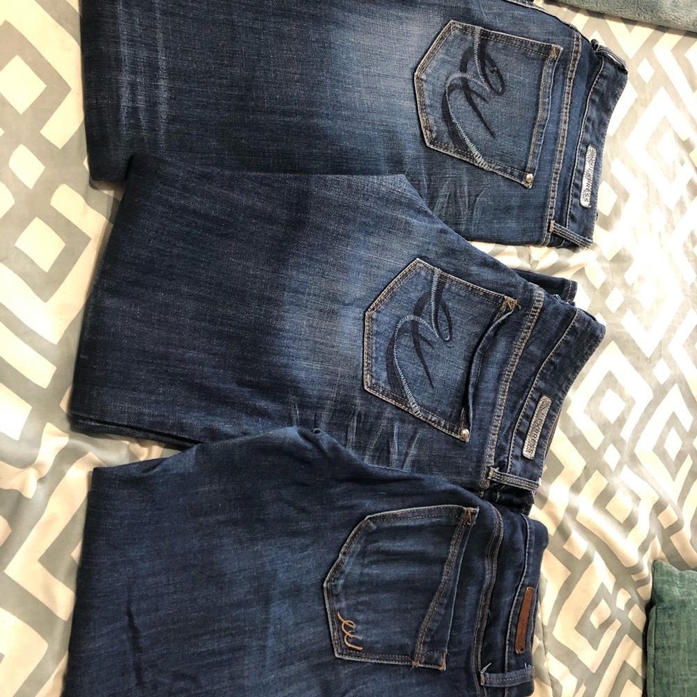 3 pr of EXPRESS jeans. 2 pr boot cut, 1 pr jegging